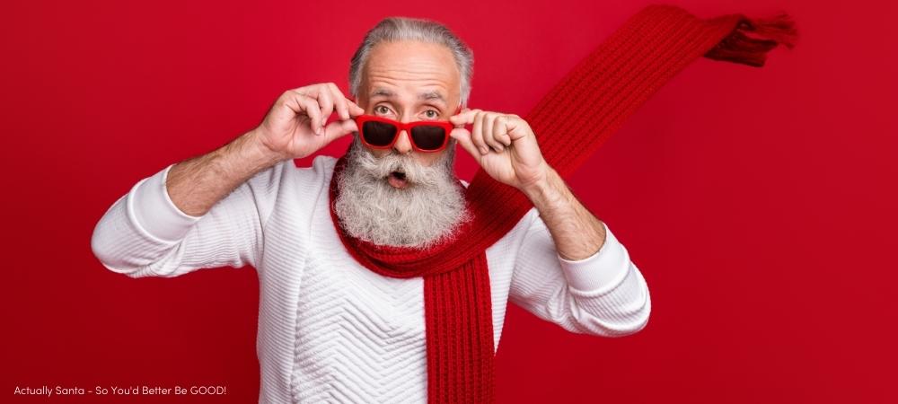 Cool aged santa man read xmas sale prices not believe eyes wear sun specs knitted jumper isolated red background