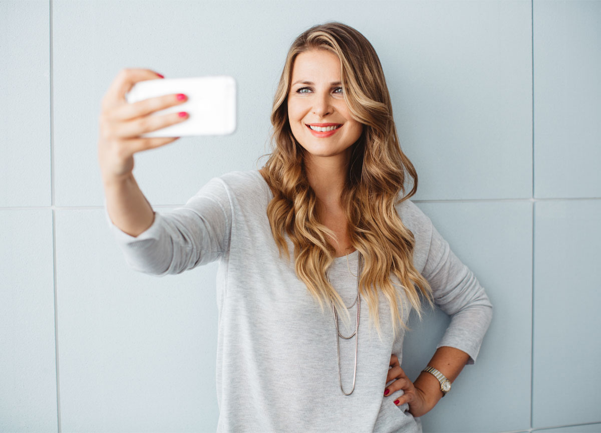 woman taking selfie