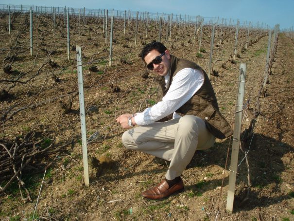 Dr. Salazar-Reyes tends to the vineyard