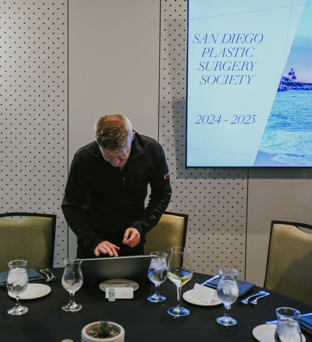 Lukasz "Luke" Swistun, MD speaking at San Diego Plastic Surgery Society