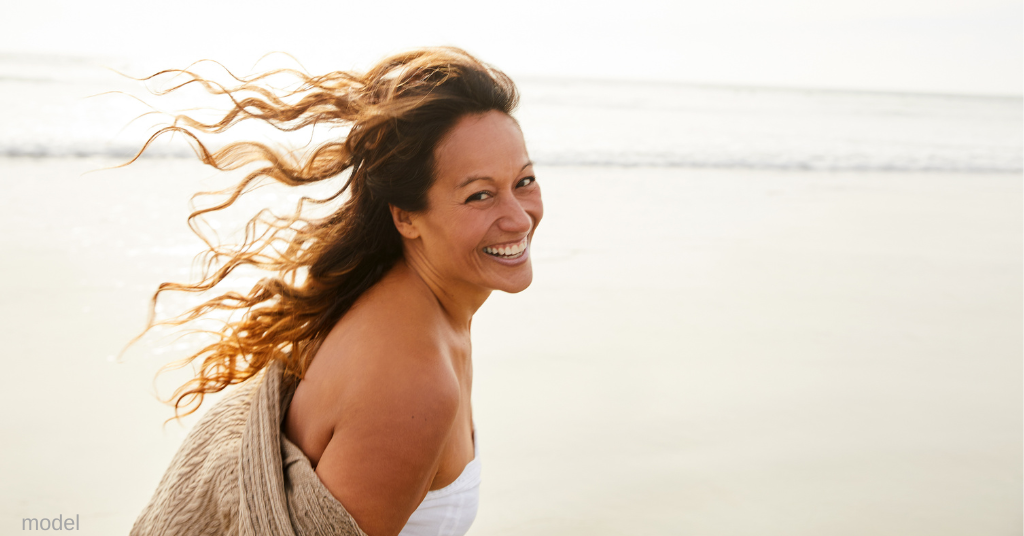 woman smiling after taking botox quiz (model)