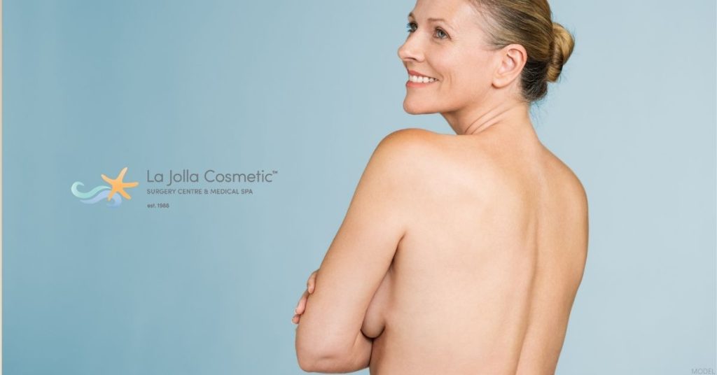 Mature woman with her hands crossed over her chest (model)