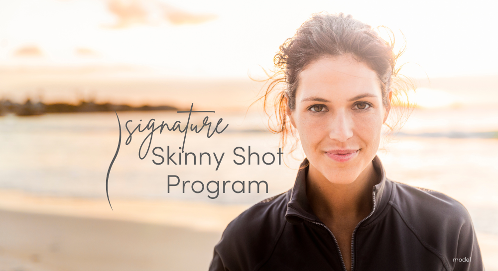 Brunette woman on the beach at sunset looking at camera. [Signature Skinny Shot Program]