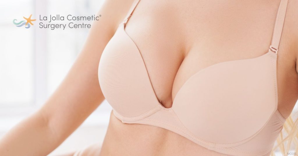 Close up of a woman's breast in nude bra. (Model)